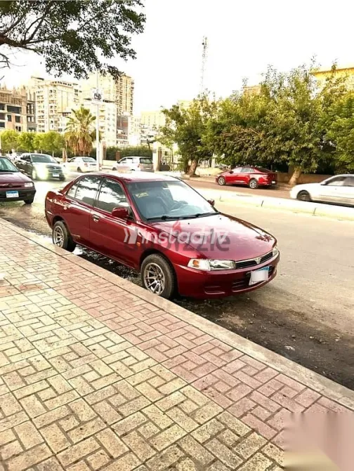 ميتسوبيشي لانسر 1996 أحمر مستعملة للبيع - 2