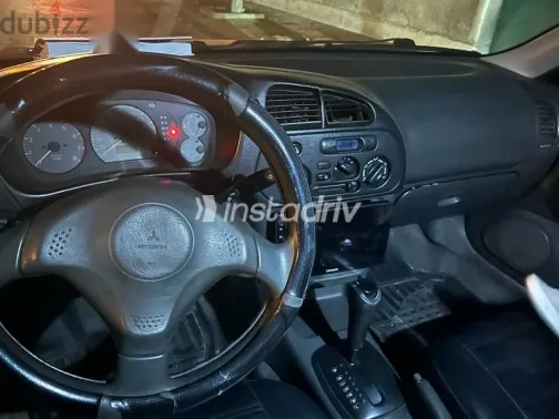 ميتسوبيشي لانسر 1996 أحمر مستعملة للبيع - 4