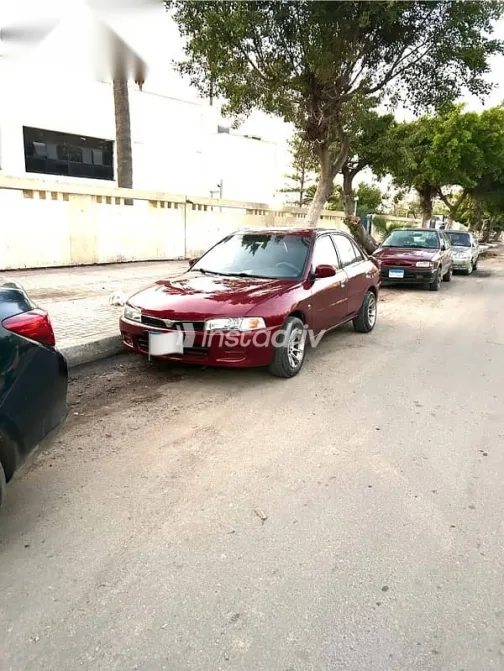 ميتسوبيشي لانسر 1996 أحمر مستعملة للبيع - 5