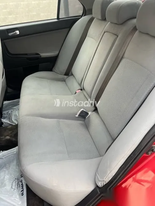 ميتسوبيشي لانسر 2009 أحمر مستعملة للبيع - 4