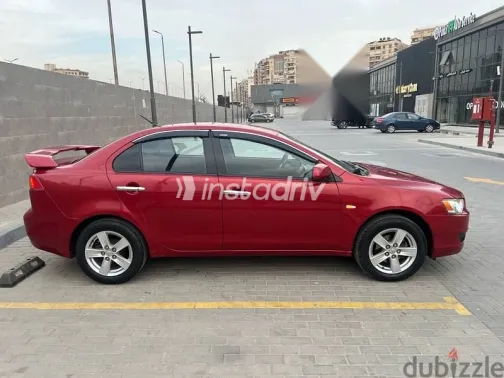 ميتسوبيشي لانسر 2009 أحمر مستعملة للبيع - 5