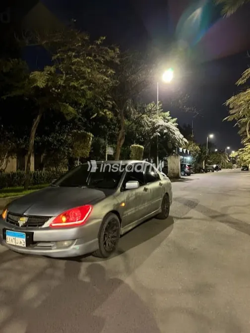 ميتسوبيشي لانسر 2007 رمادي مستعملة للبيع - 1