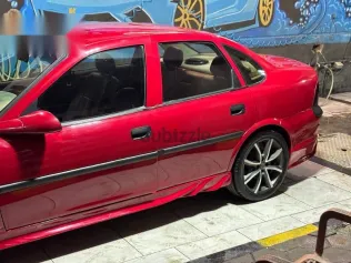 اوبل فيكترا 1997 أحمر مستعملة للبيع