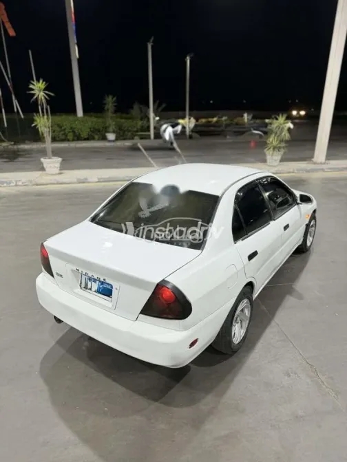 ميتسوبيشي لانسر كرستالة 1999 أبيض مستعملة للبيع - 3