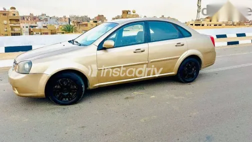 شيفروليه أوبترا 2008 ذهبي مستعملة للبيع - 3