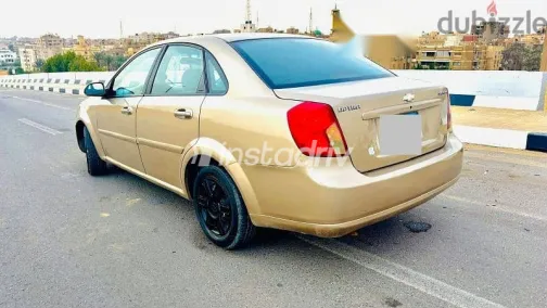 شيفروليه أوبترا 2008 ذهبي مستعملة للبيع - 4