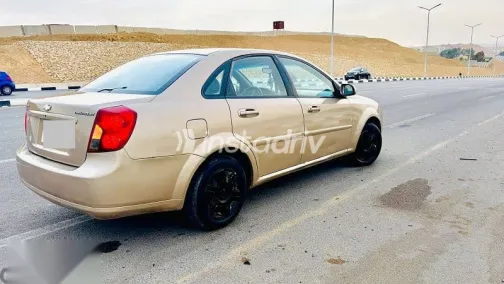 شيفروليه أوبترا 2008 ذهبي مستعملة للبيع - 5