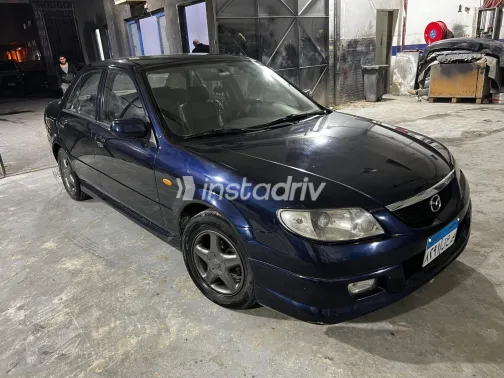 مازدا 323 2000 أبيض مستعملة للبيع - 2