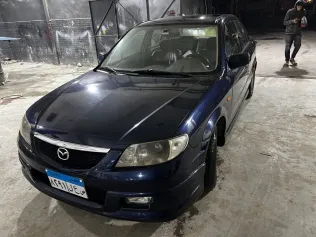 مازدا 323 2000 أبيض مستعملة للبيع