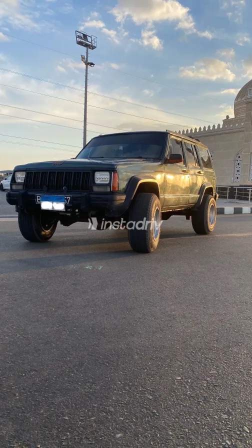 جيب شيروكي 1995 أبيض مستعملة للبيع - 5