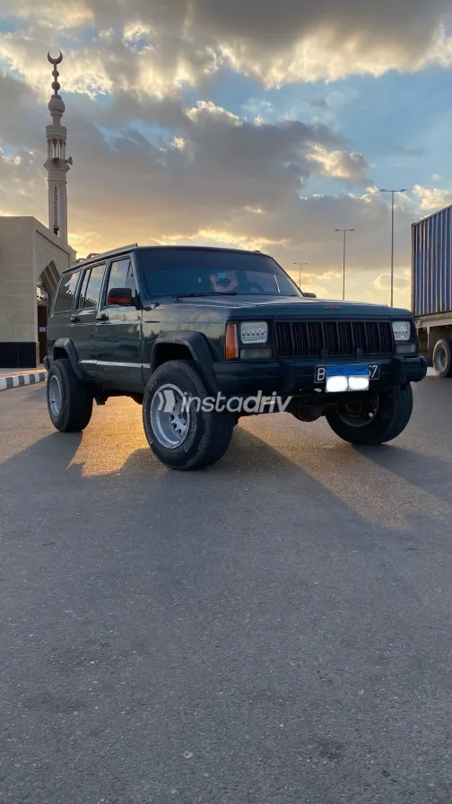 جيب شيروكي 1995 أبيض مستعملة للبيع - 6