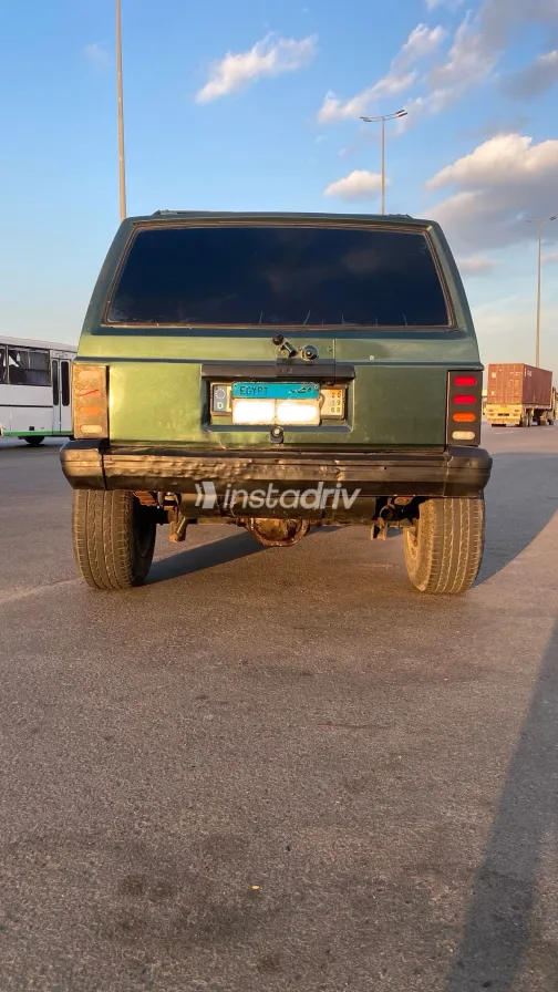 جيب شيروكي 1995 أبيض مستعملة للبيع - 10