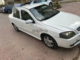 اوبل أسترا 2004 أبيض مستعملة للبيع