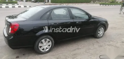 شيفروليه أوبترا 2013 أسود مستعملة للبيع - 1