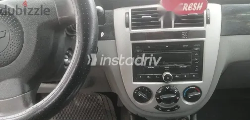 شيفروليه أوبترا 2013 أسود مستعملة للبيع - 6