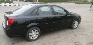 شيفروليه أوبترا 2013 أسود مستعملة للبيع