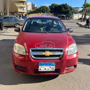 شيفروليه افيو 2009 أحمر مستعملة للبيع