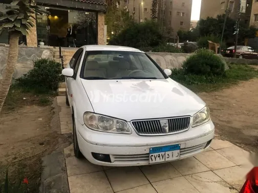 نيسان صنى 2006 أبيض مستعملة للبيع - 1