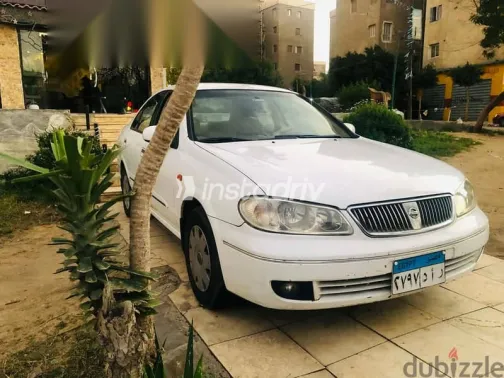 نيسان صنى 2006 أبيض مستعملة للبيع - 2