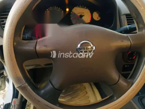 نيسان صنى 2006 أبيض مستعملة للبيع - 8