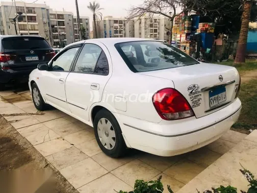 نيسان صنى 2006 أبيض مستعملة للبيع - 9