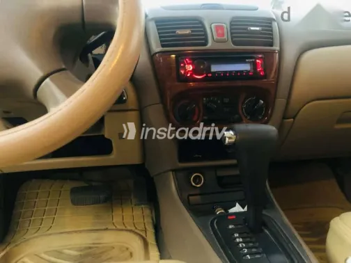 نيسان صنى 2006 أبيض مستعملة للبيع - 10