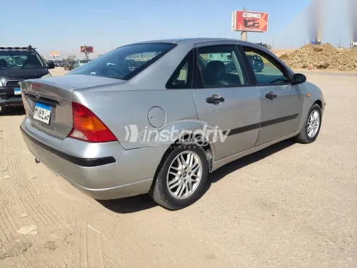 فورد فوكس 2004 فضي مستعملة للبيع - 4