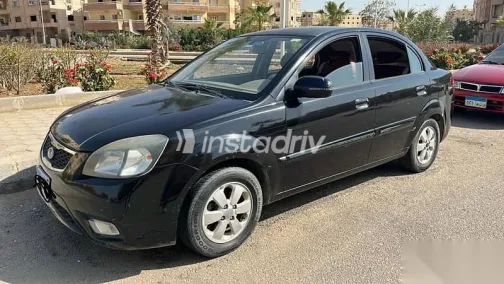 كيا ريو 2012 أسود مستعملة للبيع - 3