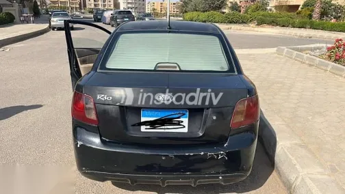 كيا ريو 2012 أسود مستعملة للبيع - 4
