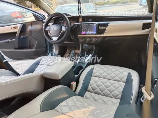 تويوتا كورولا 2015 أزرق غامق مستعملة للبيع - 6