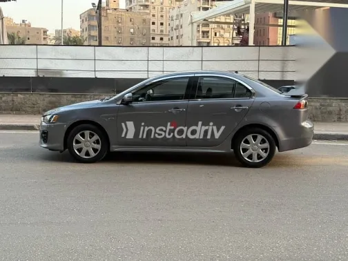 ميتسوبيشي لانسر 2016 فضي مستعملة للبيع - 2