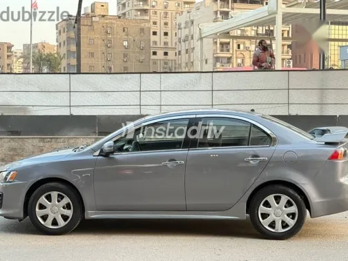 ميتسوبيشي لانسر 2016 فضي مستعملة للبيع - 3