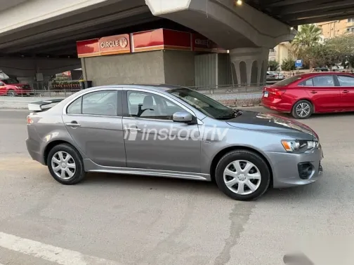 ميتسوبيشي لانسر 2016 فضي مستعملة للبيع - 8