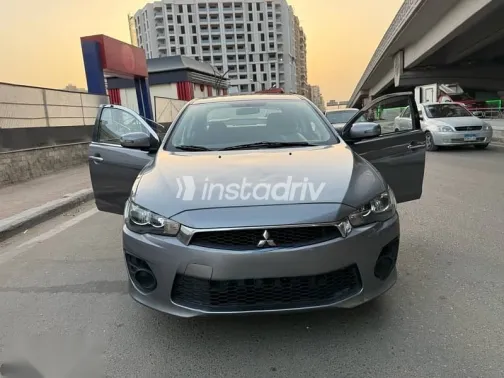 ميتسوبيشي لانسر 2016 فضي مستعملة للبيع - 9