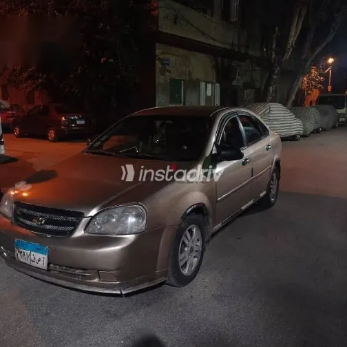 شيفروليه أوبترا 2006 ذهبي مستعملة للبيع - 2