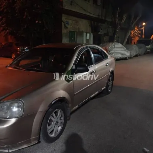 شيفروليه أوبترا 2006 ذهبي مستعملة للبيع - 5