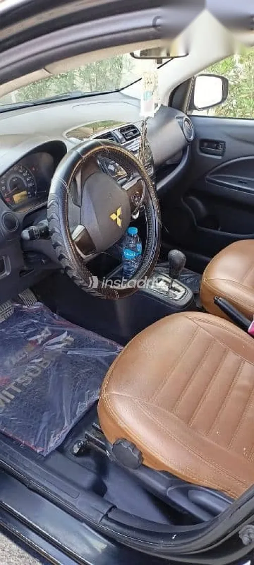 ميتسوبيشي اتراج 2015 أسود مستعملة للبيع - 3