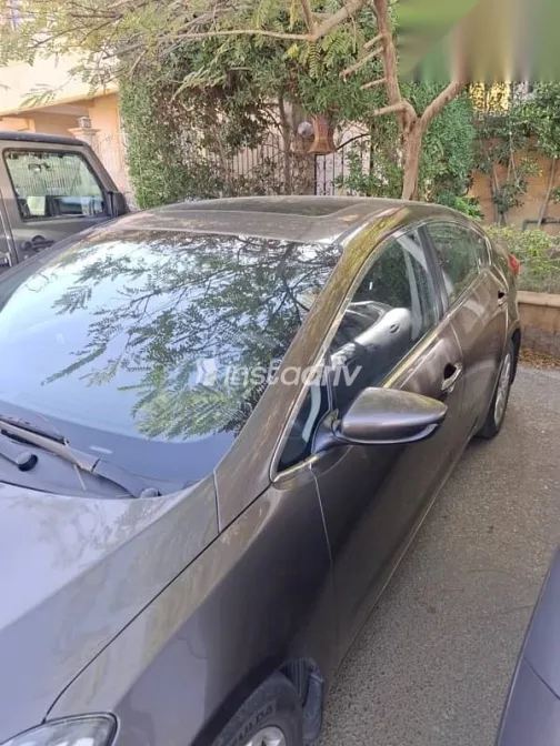 كيا سيراتو 2015 بني مستعملة للبيع - 2