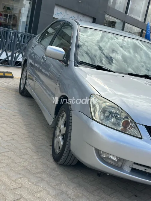 ميتسوبيشي لانسر 2007 أبيض مستعملة للبيع - 2