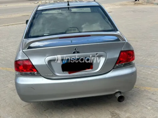 ميتسوبيشي لانسر 2007 أبيض مستعملة للبيع - 5