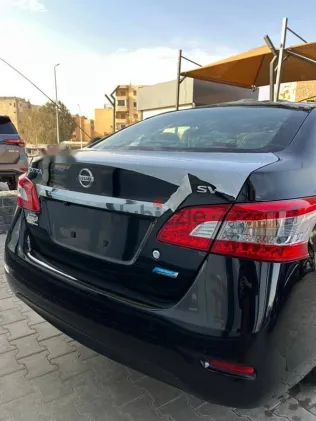 نيسان سنترا 2026 أسود جديدة للبيع