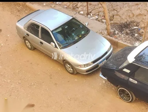 ميتسوبيشي لانسر 1992 فضي مستعملة للبيع - 7