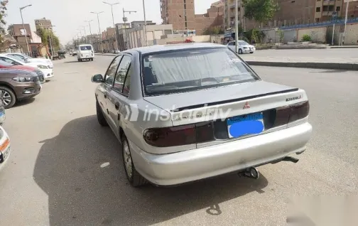 ميتسوبيشي لانسر 1992 فضي مستعملة للبيع - 8