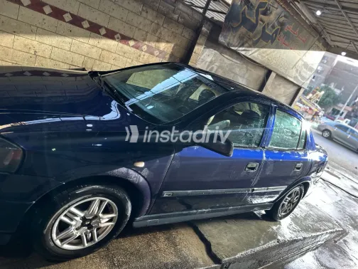 اوبل أسترا 2000 أبيض مستعملة للبيع - 5