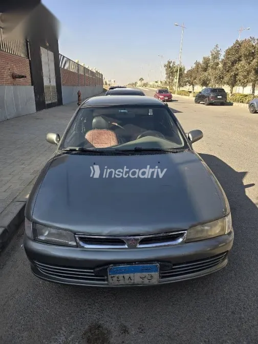 ميتسوبيشي لانسر 1994 رمادي مستعملة للبيع - 4