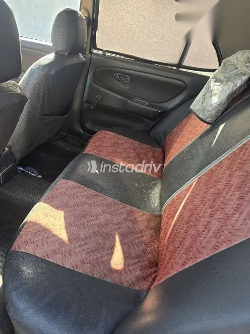 ميتسوبيشي لانسر 1994 رمادي مستعملة للبيع - 5