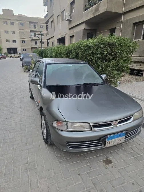 ميتسوبيشي لانسر 1994 رمادي مستعملة للبيع - 7