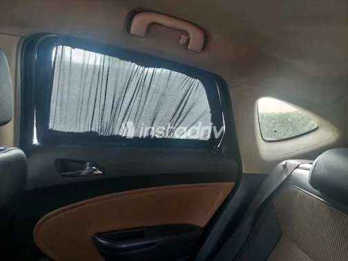 اوبل أسترا 2013 أبيض مستعملة للبيع - 8