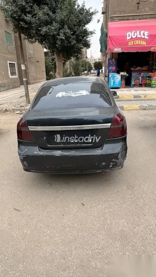 شيفروليه افيو 2013 أسود مستعملة للبيع - 1