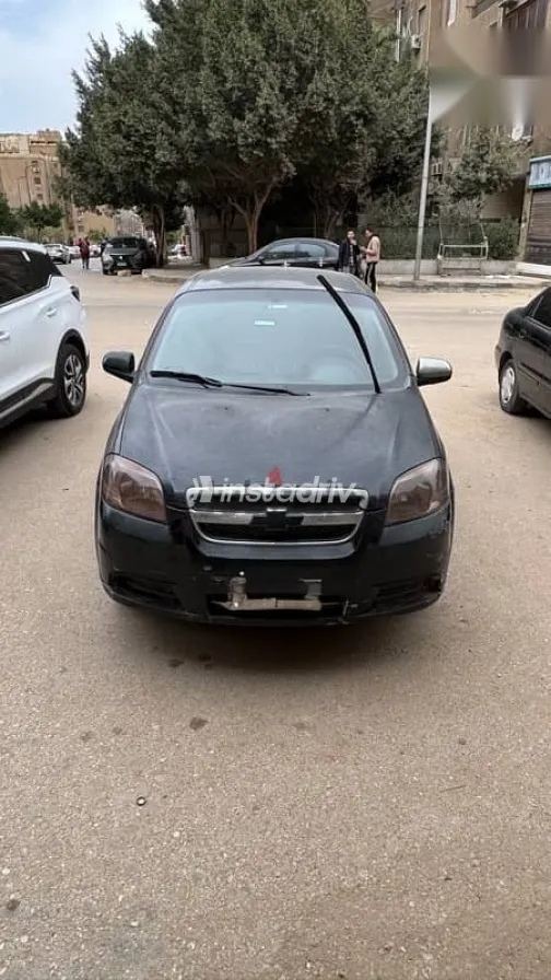 شيفروليه افيو 2013 أسود مستعملة للبيع - 2